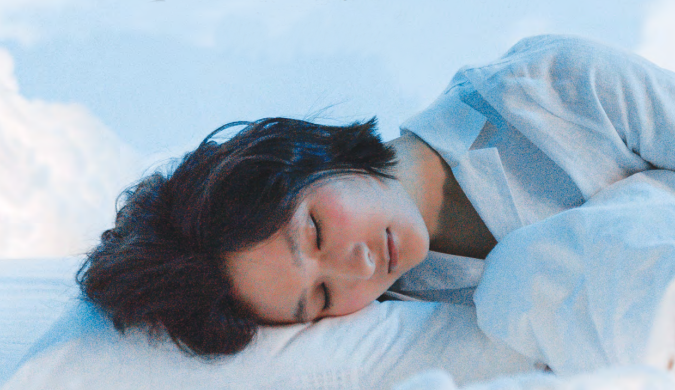 a woman sleeping with the help of hypnosis by booking an appoinment with Michelle Bryan